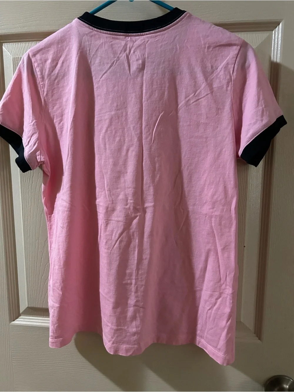 Nike Pink Ringer Tee with Floral Logo and Black Trim